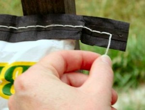 pull the string to open a feed sack